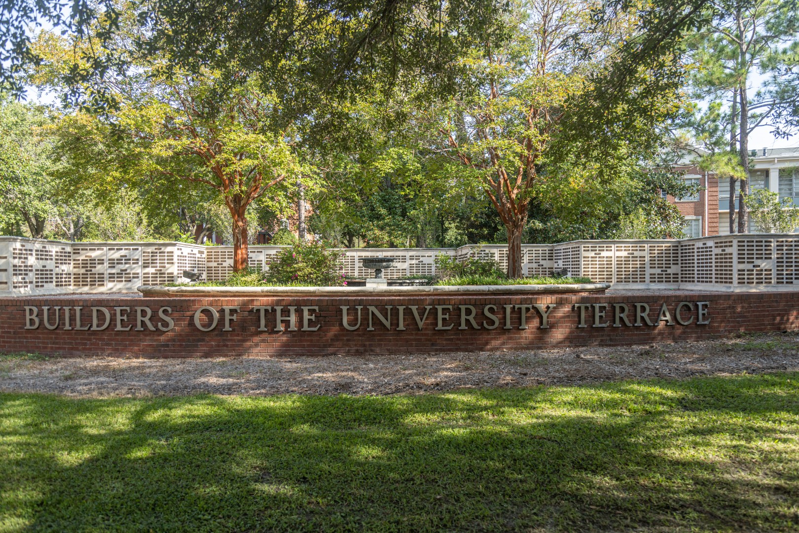 Close-up of bronze plaques on the terrace
